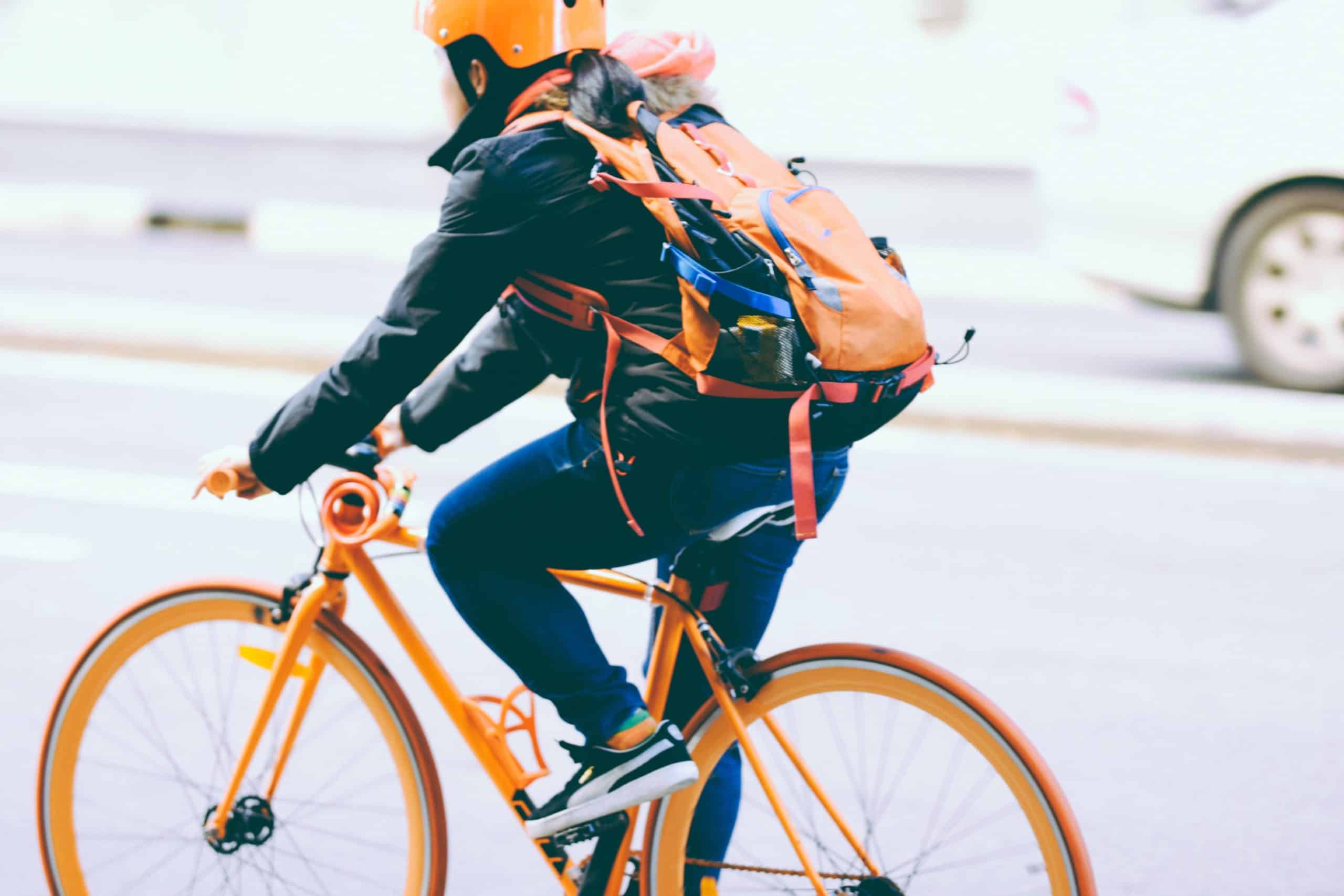 bicyclist with backpack